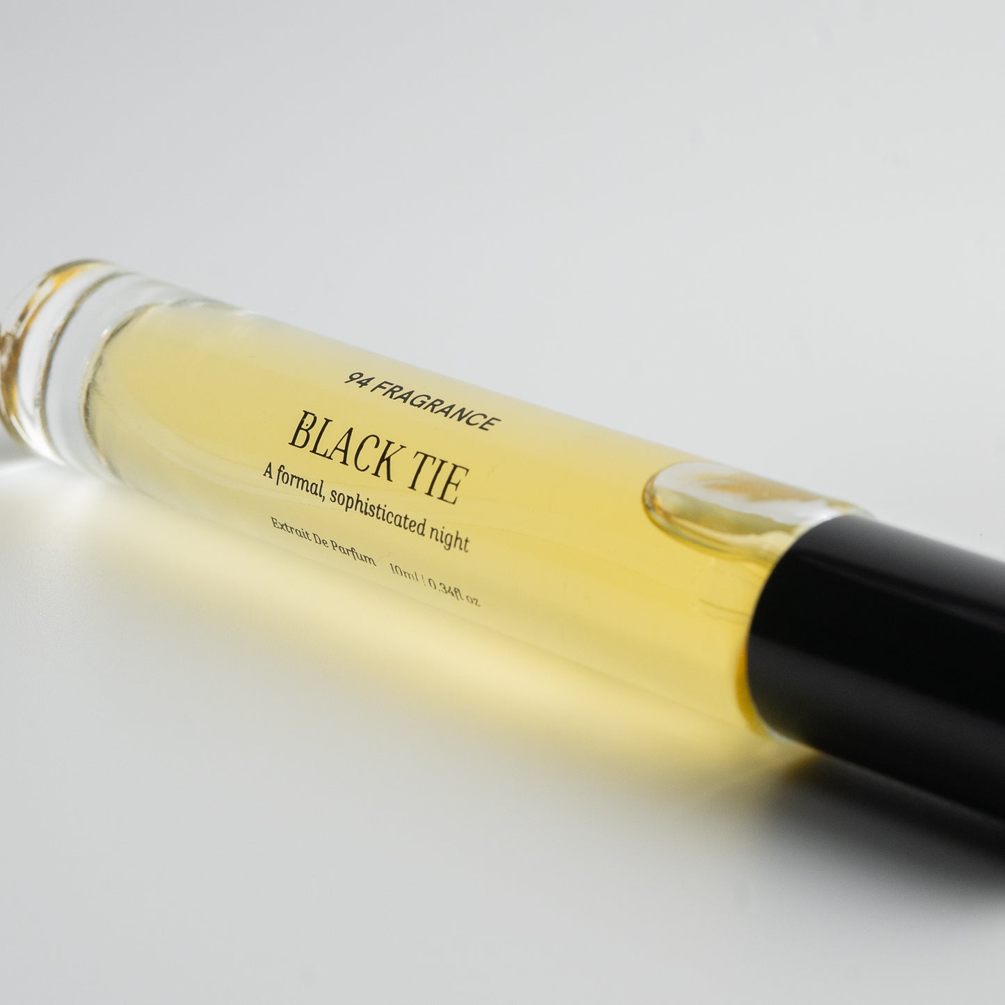Close up shot of a perfume called Black Tie by 94 Fragrance.